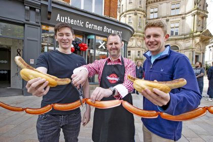 The people of Birmingham cut the ribbon for the opening of Extrawurst in New Street