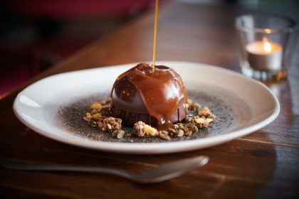 Cosy up around the fire this Valentine’s Day at The Manor House of Whittington