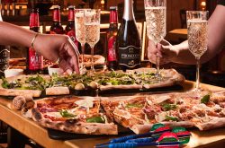 Flight Club Marks Graduation Season with Free Fizz