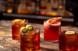 CELEBRATE NEGRONI MONTH AT 24 STORIES WITH THREE NEW COCKTAILS